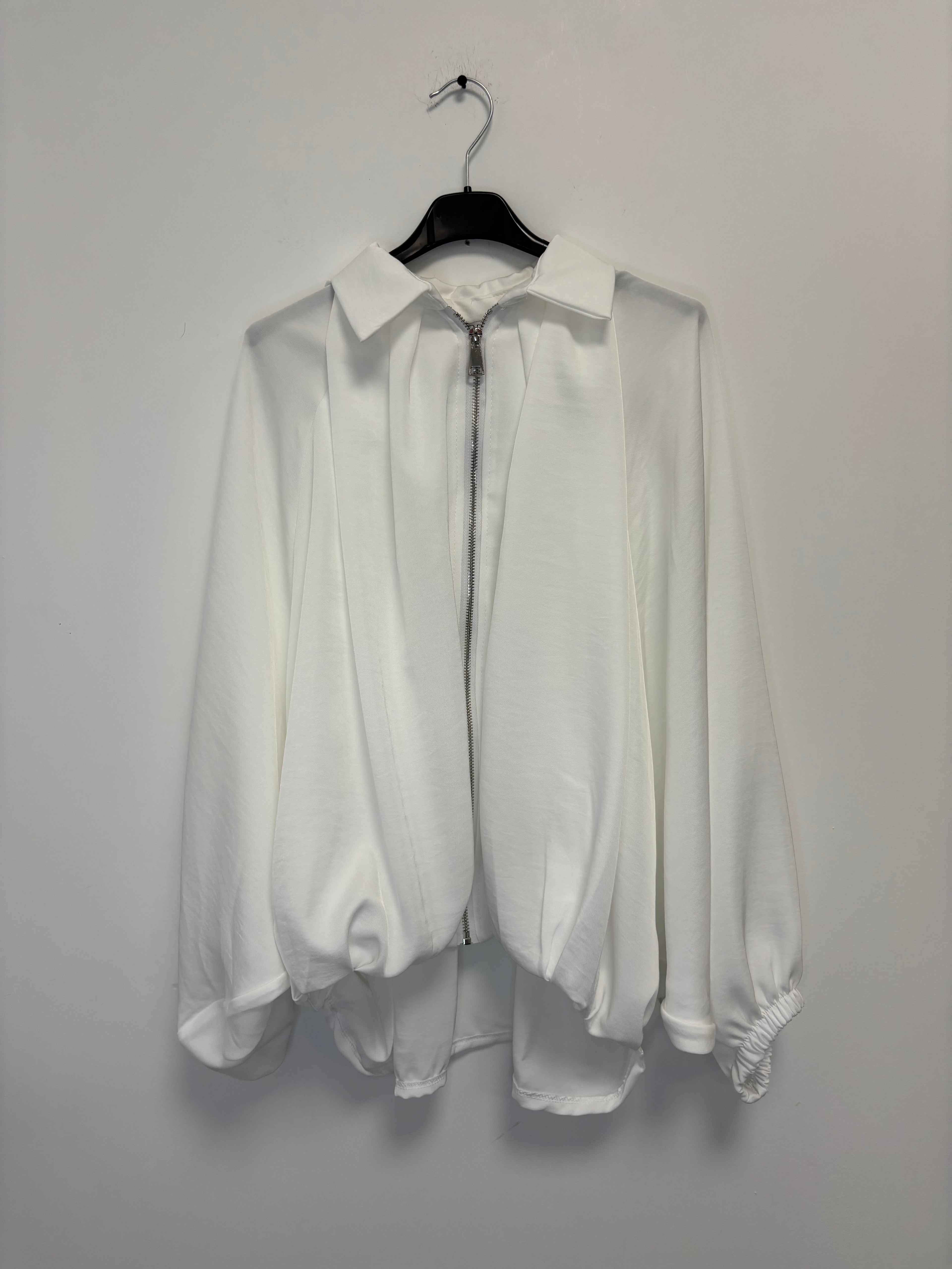 VESTE